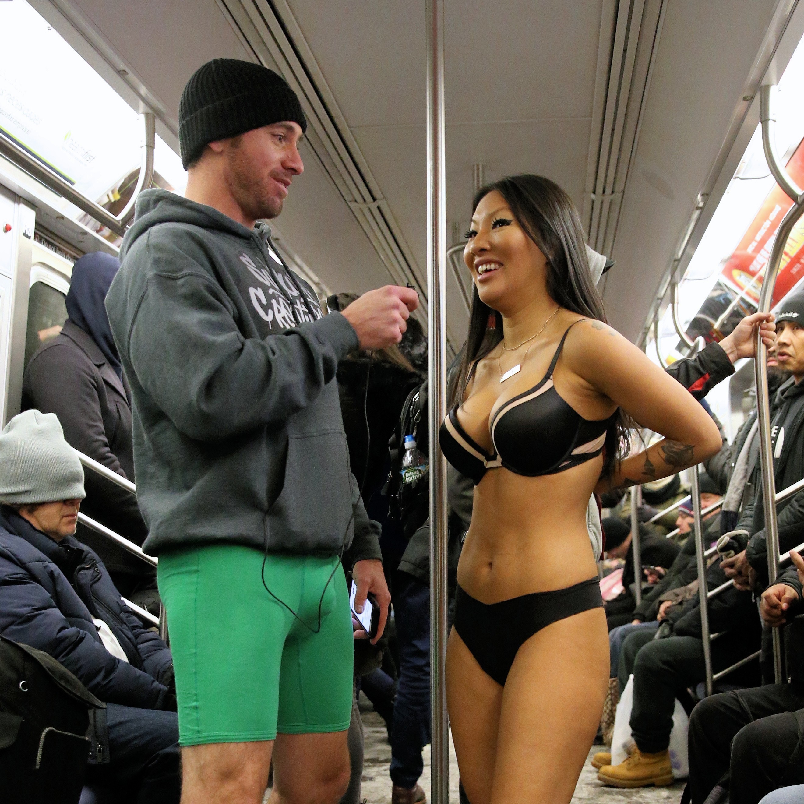 Asa Akira stealing the show as she appears topless in public.