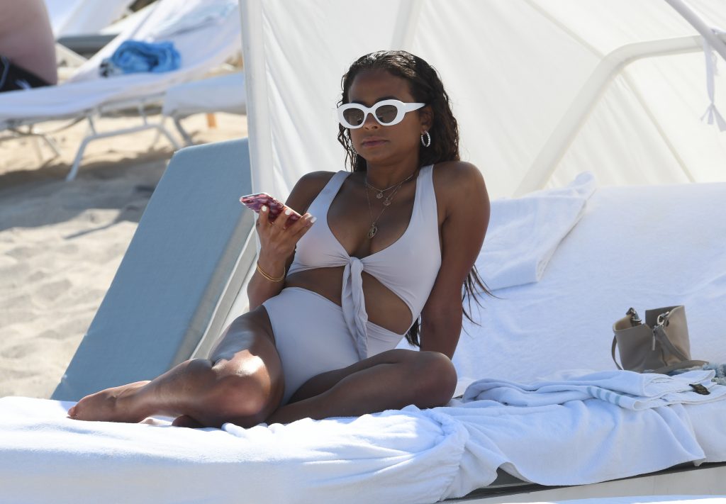 Christina Milian looking insanely sexy in her white swimsuit gallery, pic 20