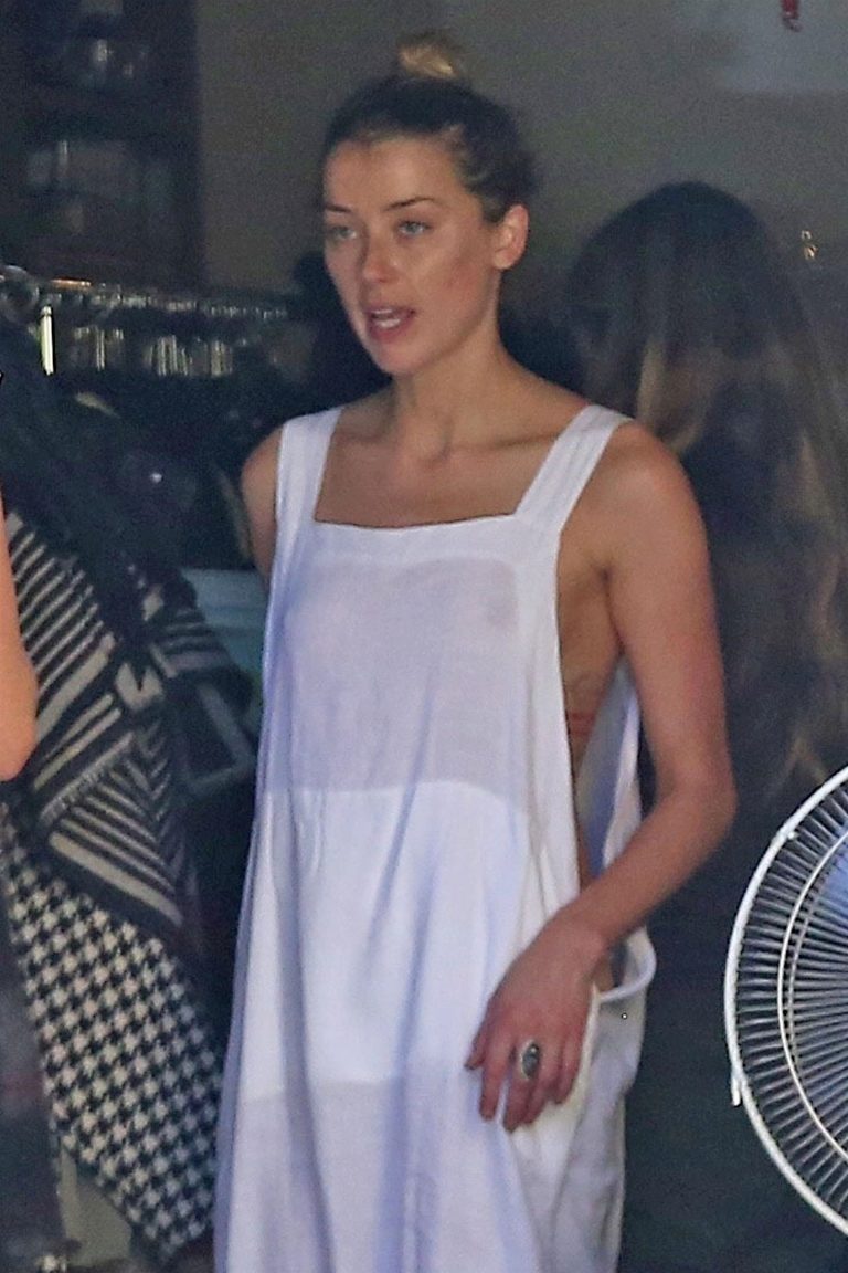 Amber Heard accidentally flashes her nipple (and her bare breast as
