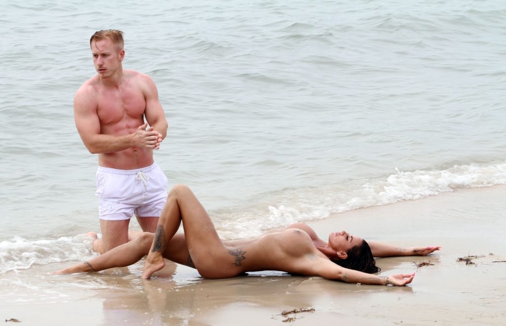 Katie Price bares it all, showing off her perfect body on a beach gallery, pic 54