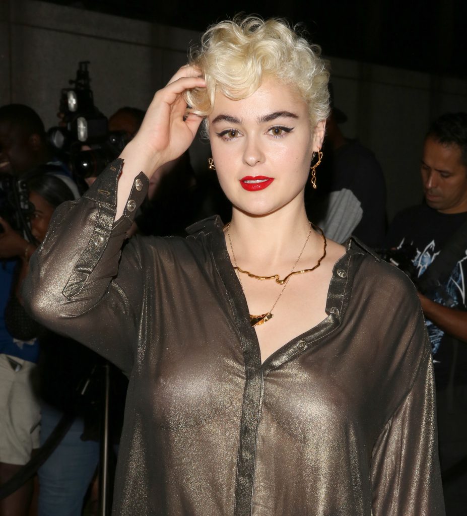 Blond-haired vixen Stefania Ferrario showing her natural breasts in public gallery, pic 10