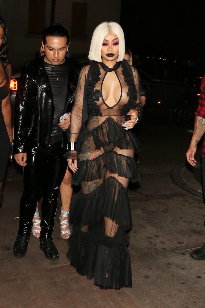 Blac Chyna showcases her ample assets in a see-through black outfit gallery, pic 4