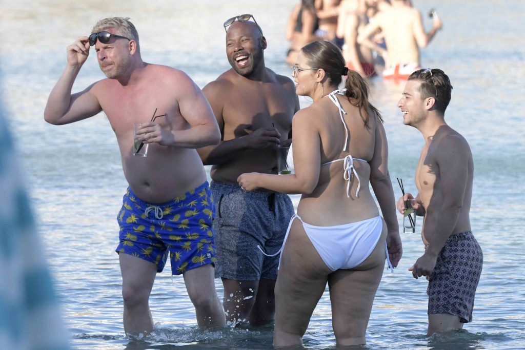 Ashley Graham soaking up the sun in a revealing white bikini gallery, pic 6