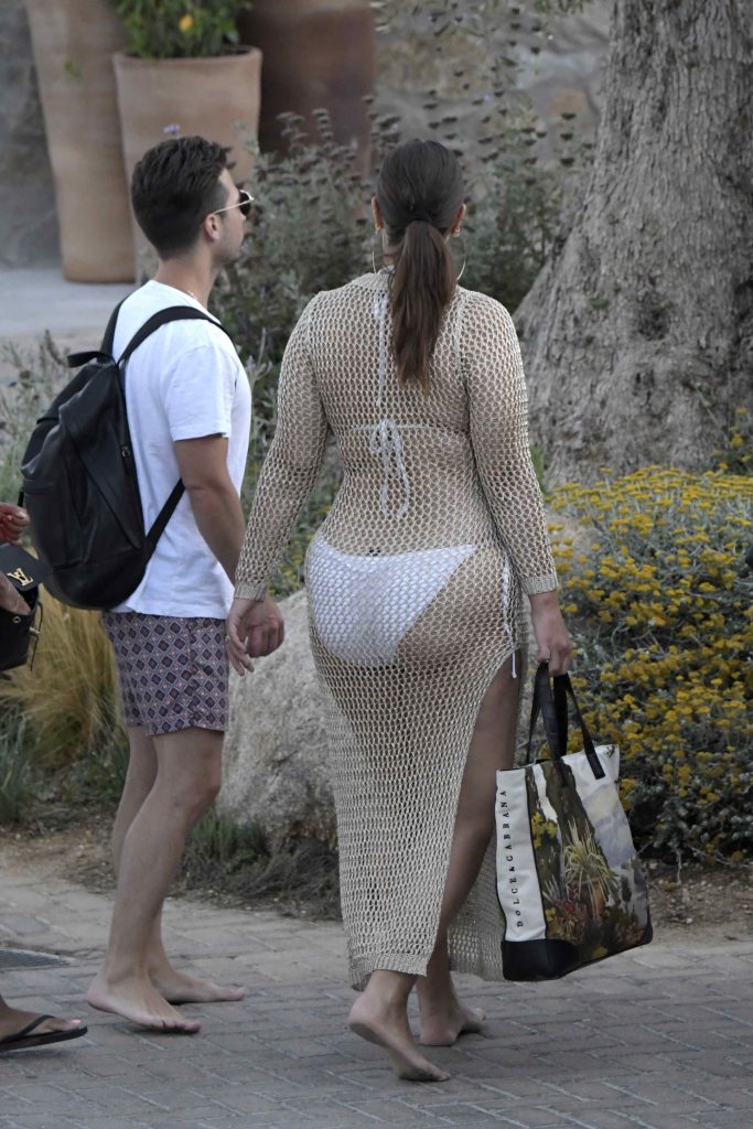 Ashley Graham soaking up the sun in a revealing white bikini gallery, pic 8