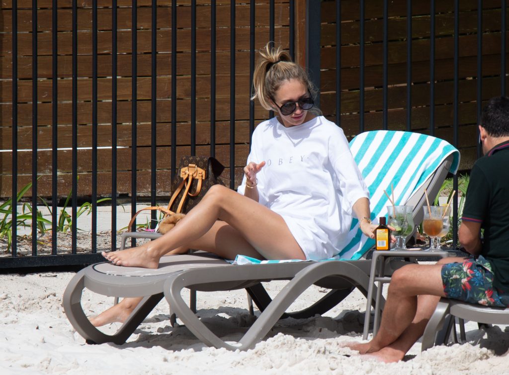 Megan McKenna downing drinks and looking hot in her bikini gallery, pic 24