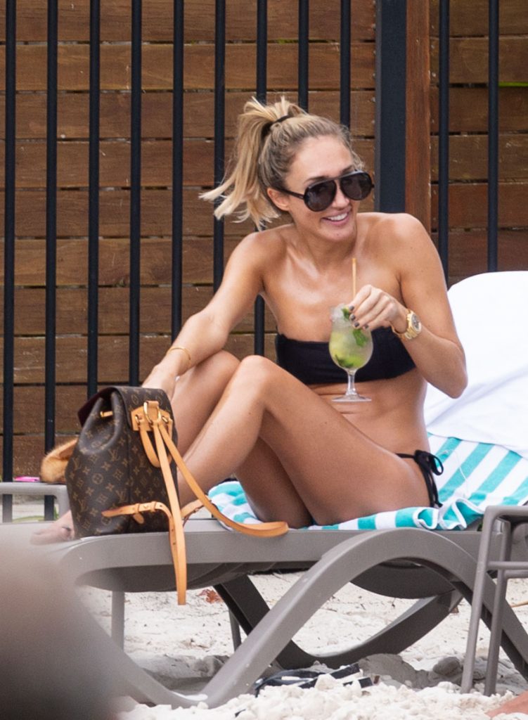 Megan McKenna downing drinks and looking hot in her bikini gallery, pic 42