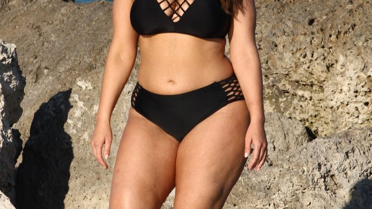 Brave and stunning model Ashley Graham showing her rolls and curves