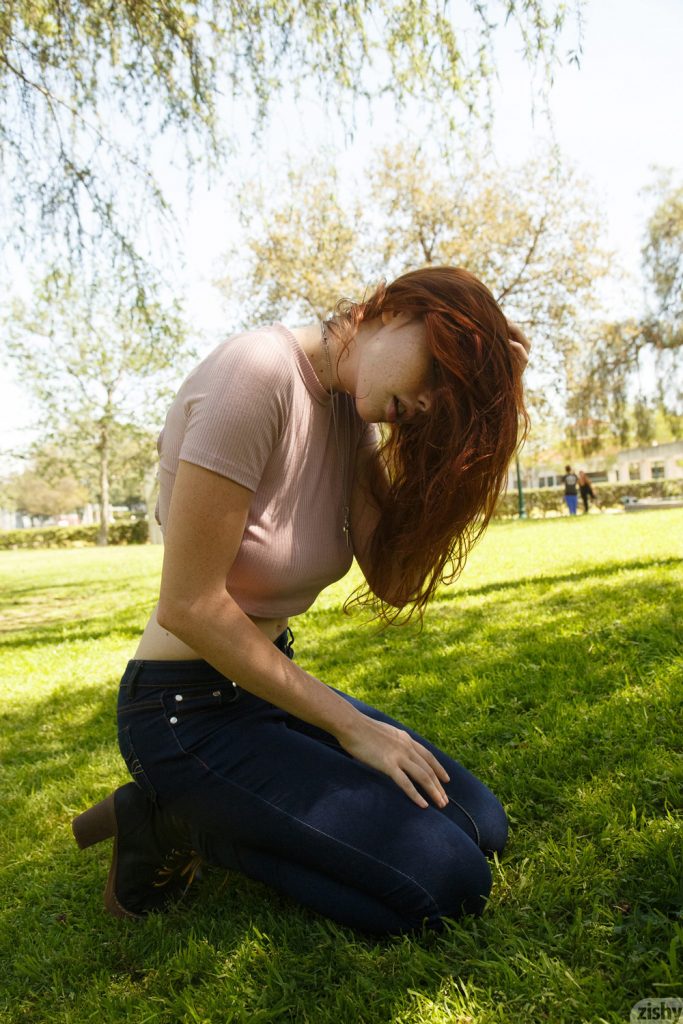 Redheaded teen Sabrina Lynn showing major underboob in a public park gallery, pic 14