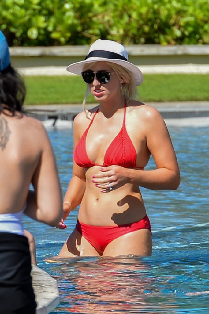 Gorgeous blonde Courtney Force sizzles in a very stylish red bikini gallery, pic 2