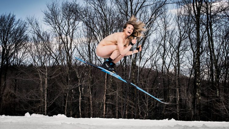 Crazy blonde Jessie Diggins skiing naked in the winter forest
