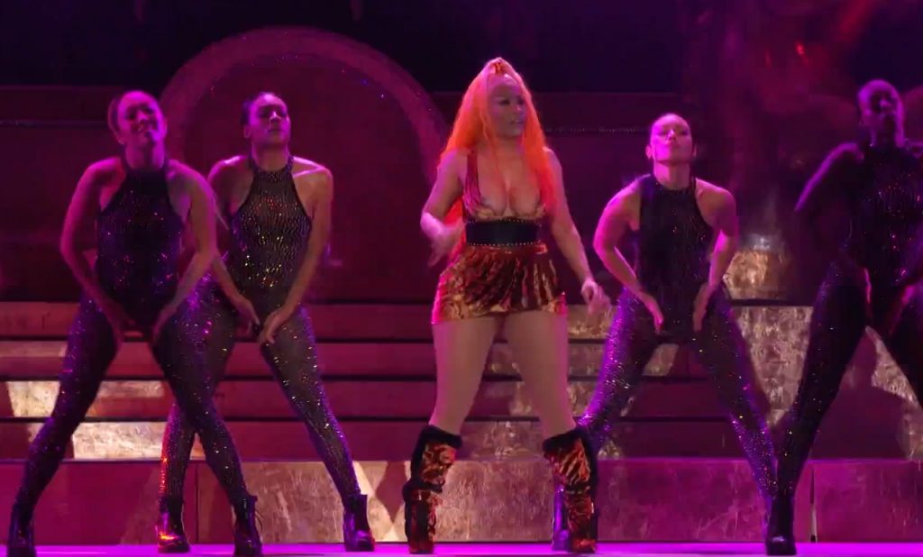 Nicki Minaj busts out of her top during a live performance (nip slip) video screenshot 6