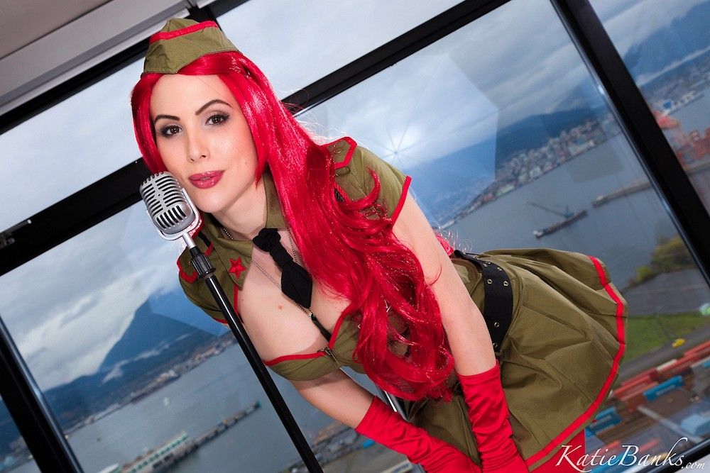 Katie Banks showing her big breasts in a military cosplay gallery.