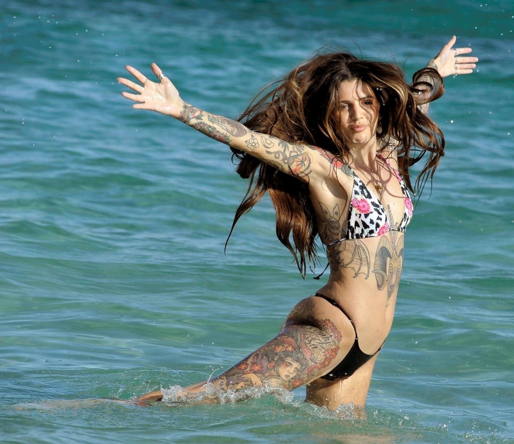 Bikini-clad Darylle Sargeant enjoys frolicking in the water gallery, pic 22