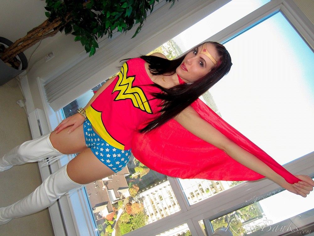 Katie Banks puts on her Wonder Woman outfit and does some karate kicks.