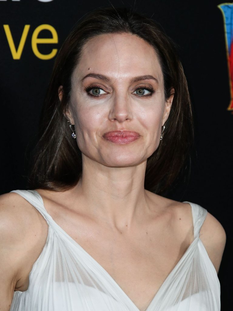 Hollywood’s Hottest MILF Angelina Jolie Shows Her Cleavage gallery, pic 16