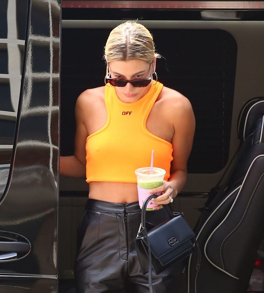 Hailey Bieber Showing Her Pokies While Walking Around Braless gallery, pic 8