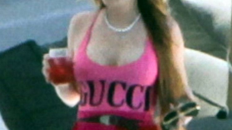 Lindsay Lohan Showing Her Big Boobs While Chilling and Drinking