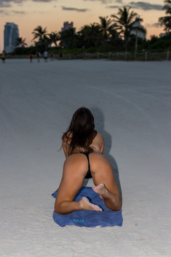 Topless Claudia Romani Rolling Around in the Sand, Looking Dumb gallery, pic 14