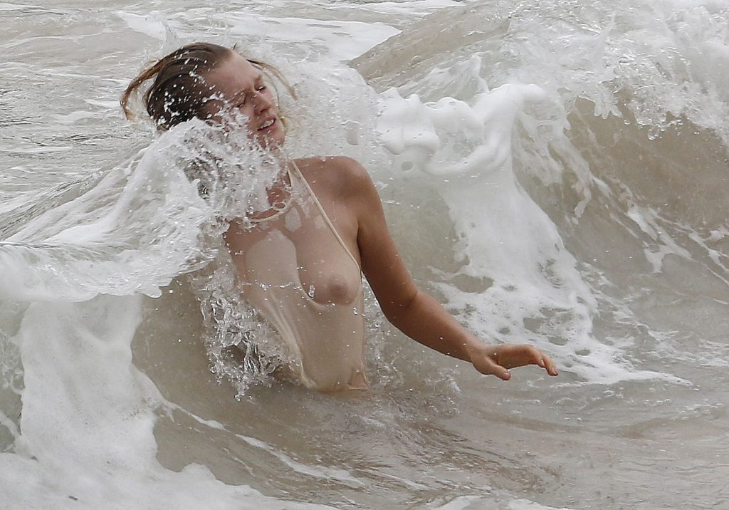 Shameless Model Toni Garrn Shows Her Small Tits in a Wet Shirt gallery, pic 14