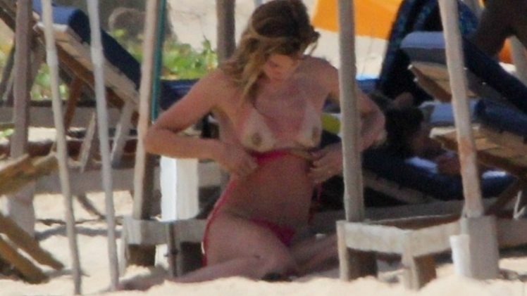 Topless Doutzen Kroes Showing Her Small Breasts and Looking Hot in a Bikini