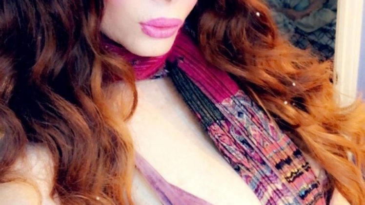 Repulsive Redhead Phoebe Price Showing Her Tits in Public Once Again