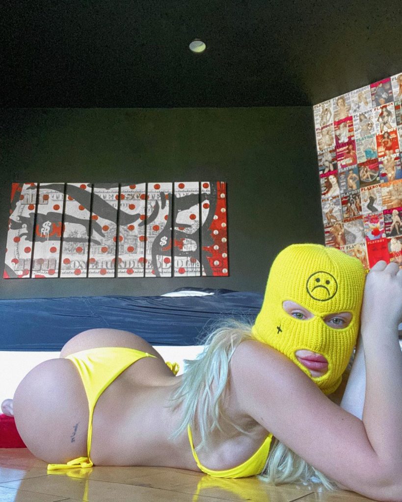 Masked Tana Mongeau Flips You Off While Wearing a Slutty Bikini gallery, pic 8