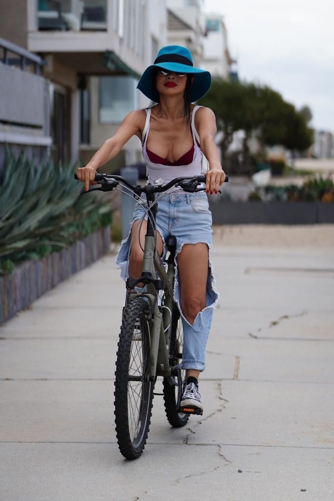Asian MILF Bai Ling Biking and Showing Her Boobs While Outdoors gallery, pic 8
