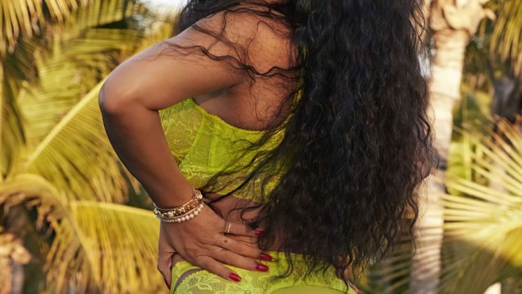 Thick Beauty Rihanna Shows Her Big Butt and Pretty Face in an Ad