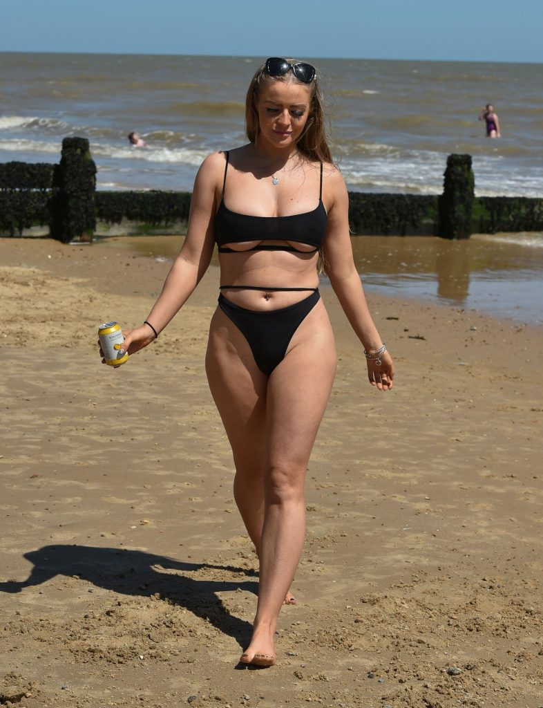 Young Thickie Megan Clark Displaying Her Body in a Black Swimsuit gallery, pic 8