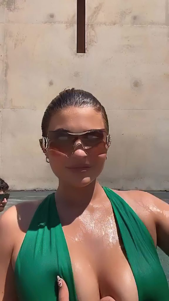 Social Media Superstar Kylie Jenner Flaunts Her Titties in the Pool video screenshot 36