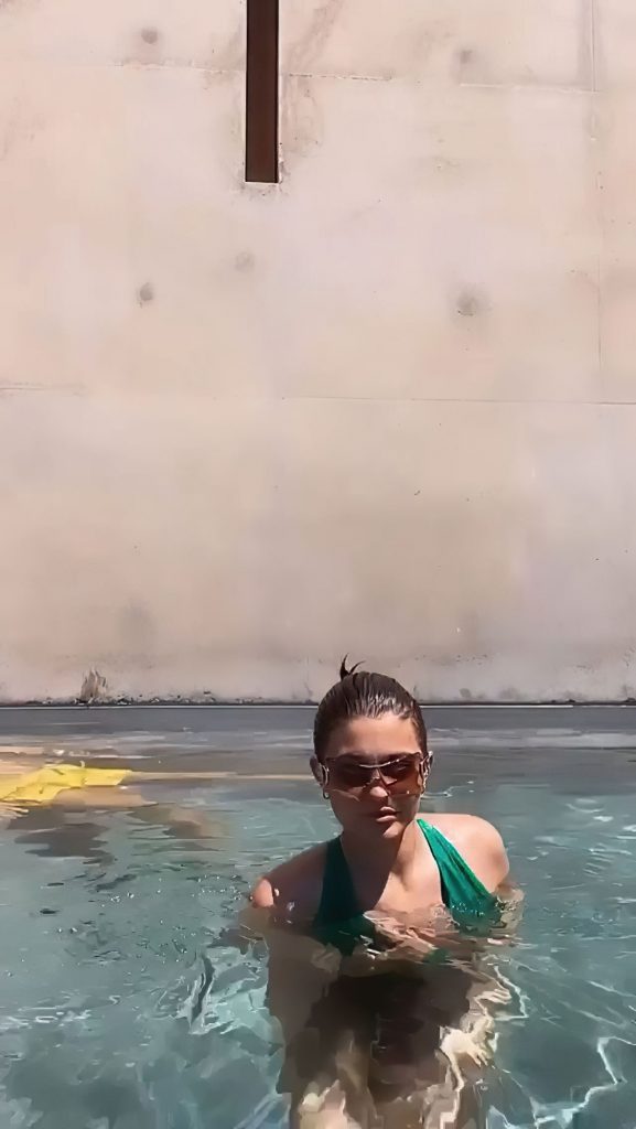 Social Media Superstar Kylie Jenner Flaunts Her Titties in the Pool video screenshot 10
