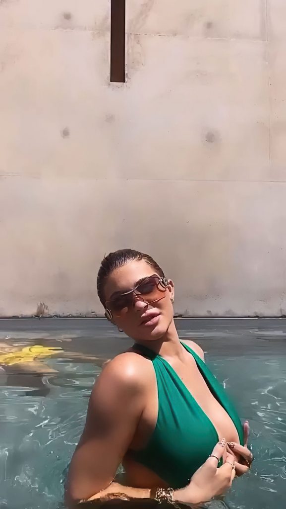 Social Media Superstar Kylie Jenner Flaunts Her Titties in the Pool video screenshot 12