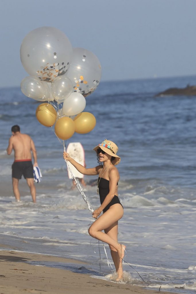 Brunette Beauty Olivia Culpo Shows Her Legs in a One-Piece Swimsuit gallery, pic 18