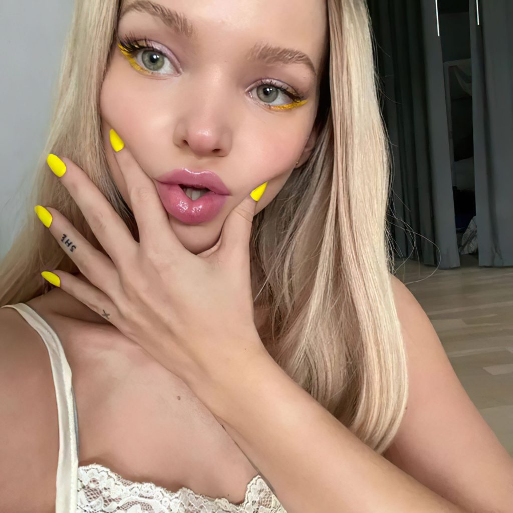 Doll-Faced Dove Cameron Showing Her Boobs for the Camera gallery, pic 18
