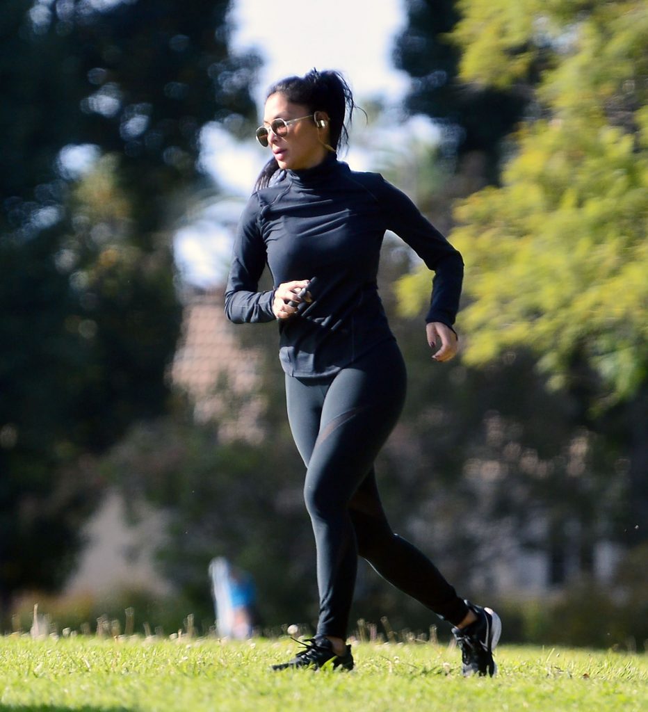 Gorgeous Nicole Scherzinger Running Around and Squatting in a Park gallery, pic 2