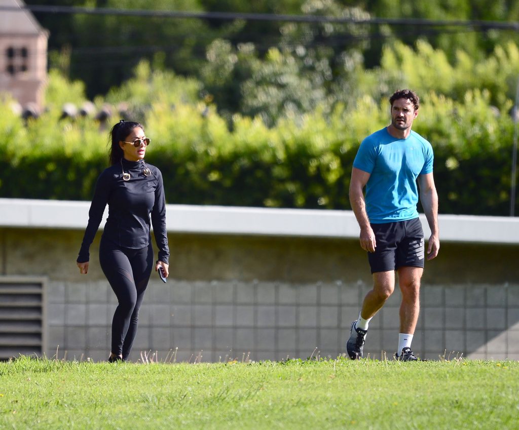 Gorgeous Nicole Scherzinger Running Around and Squatting in a Park gallery, pic 24