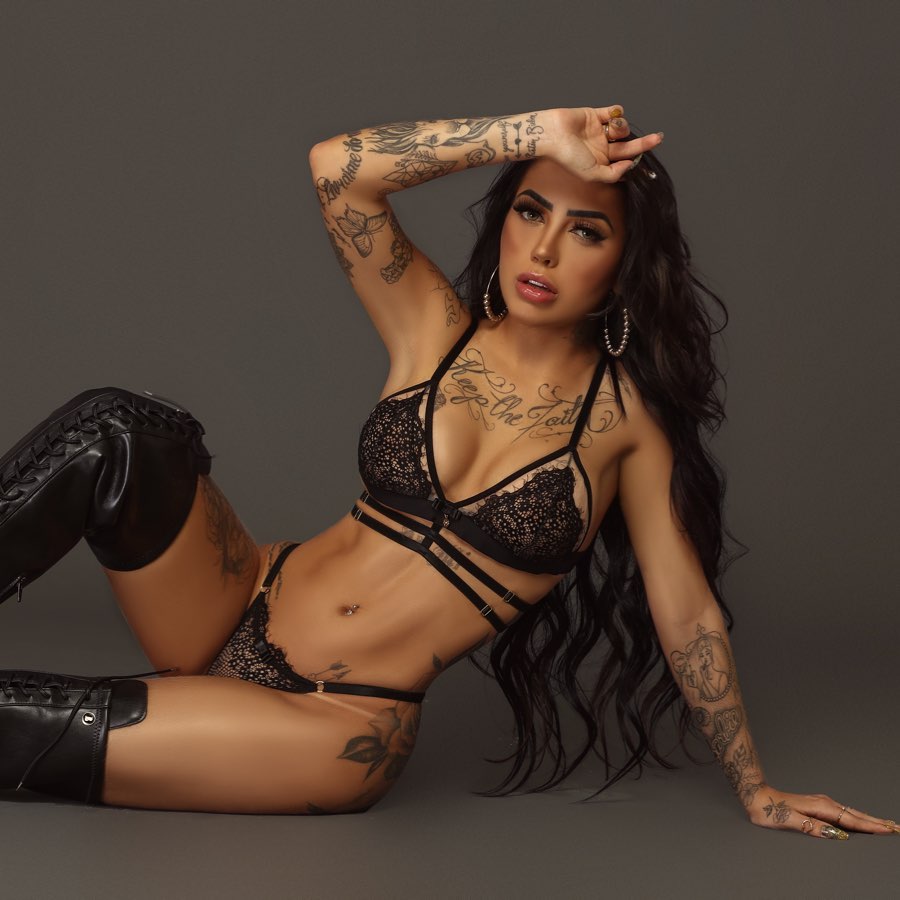 Inked-Up Latino Stunner MC Mirella Showing Off Her Curvy Body.