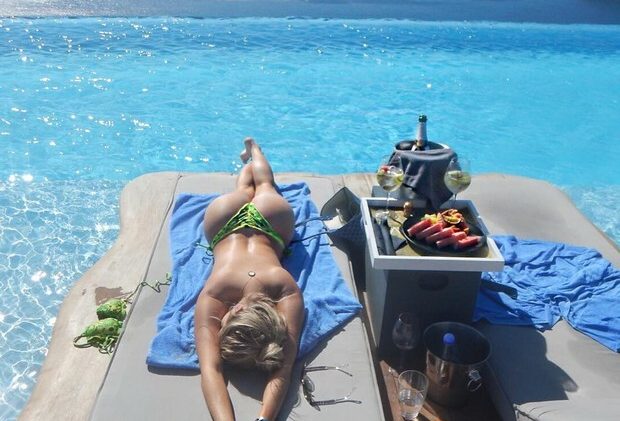 Leggy Bárbara Evans Posing in Bikinis and Sunbathing Topless