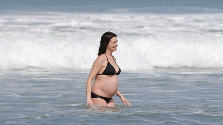 Check Out Pregnant Anne Hathaway’s Suckable Pokies and More