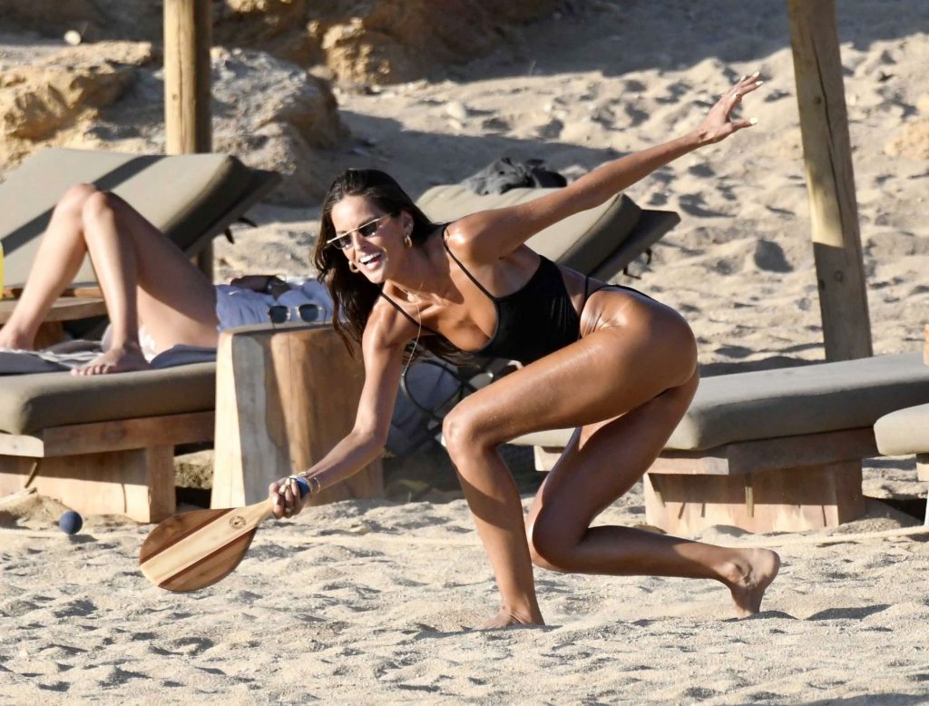 Tanned Brunette Izabel Goulart Shows Her Long Legs While Playing on the Beach gallery, pic 18