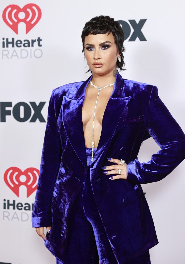 Brunette Celebrity Demi Lovato Shows That Cleavage in a Weird Purple Outfit gallery, pic 8