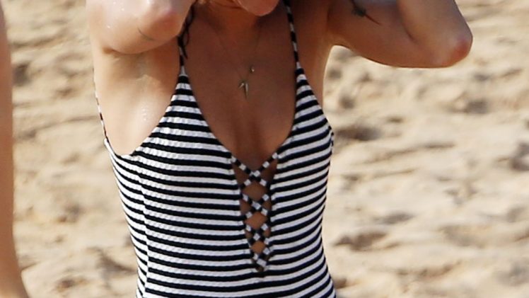 Thin Hottie Jessica Szohr Demonstrates Her Body in a Snug One-Piece Swimsuit