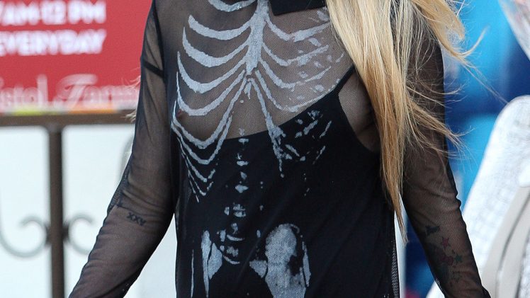 Pop Punk Princess Avril Lavigne Accidentally Exposing Her Nipple in a See-Through Outfit