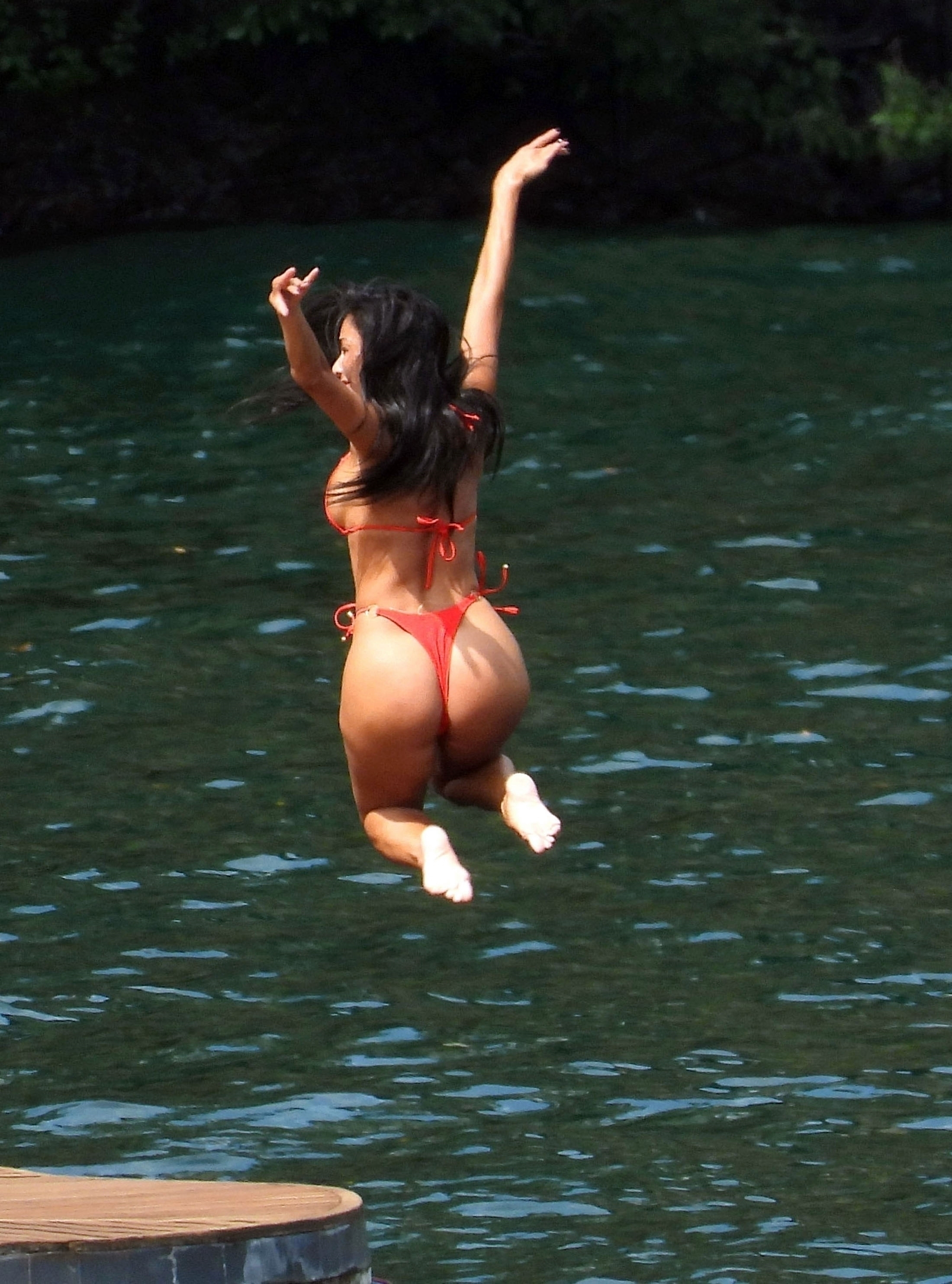 Playful Brunette Nicole Scherzinger Shows Her Juicy Booty in a Sexy Swimsuit